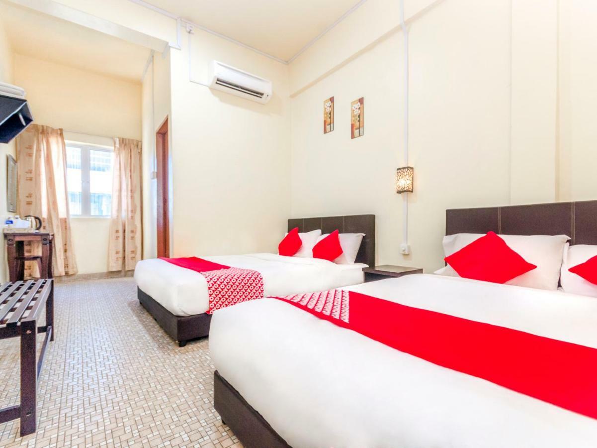 Oyo 703 Myra Hotel Мерсінг Екстер'єр фото