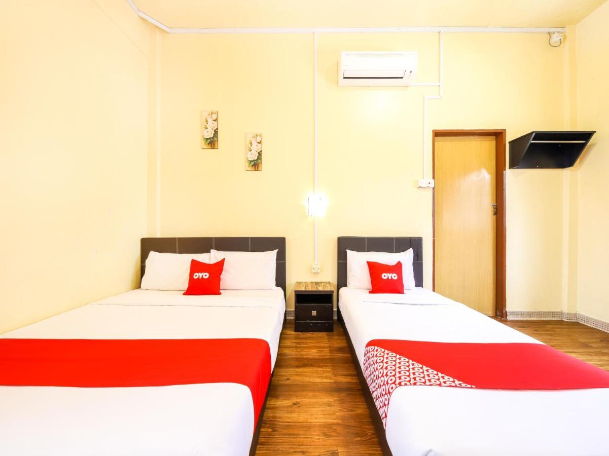 Oyo 703 Myra Hotel Мерсінг Екстер'єр фото